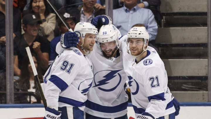 TORONTO, ON – OCTOBER 10: Nikita Kucherov #86 of the Tampa Bay Lightning celebrates his goal against the Toronto Maple Leafs with teammates Steven Stamkos #91 and Brayden Point #21 during the third at the Scotiabank Arena on October 10, 2019 in Toronto, Ontario, Canada. (Photo by Mark Blinch/NHLI via Getty Images)