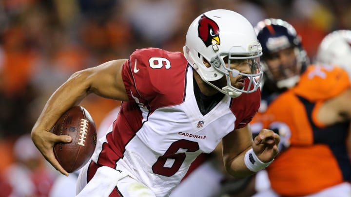 DENVER, CO – SEPTEMBER 03: Quarterback Logan Thomas #6 of the Arizona Cardinals carries the ball against the Denver Broncos during preseason action at Sports Authority Field at Mile High on September 3, 2015 in Denver, Colorado. The Cardinals defeated the Broncos 22-20. (Photo by Doug Pensinger/Getty Images)