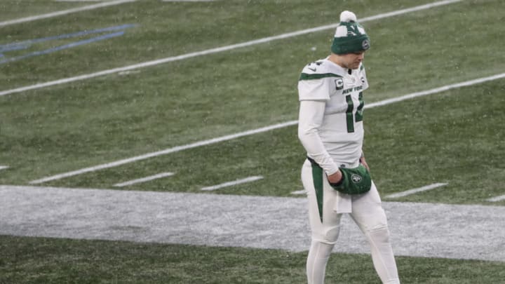Jan 3, 2021; Foxborough, Massachusetts, USA; New York Jets quarterback Sam Darnold (14) walks alone on the sidelines during the second half of their loss to the New England Patriots at Gillette Stadium. Mandatory Credit: Winslow Townson-USA TODAY Sports