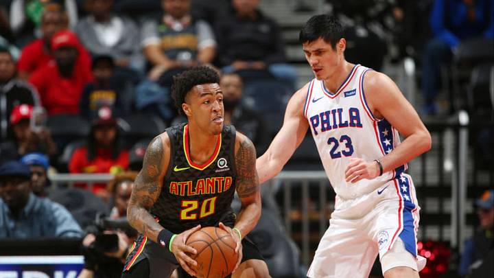 ATLANTA, GA - APRIL 10: John Collins #20 of the Atlanta Hawks moves to pass the ball during the game against Ersan Ilyasova #23 of the Philadelphia 76ers on April 10, 2018 at Philips Arena in Atlanta, Georgia. NOTE TO USER: User expressly acknowledges and agrees that, by downloading and/or using this Photograph, user is consenting to the terms and conditions of the Getty Images License Agreement. Mandatory Copyright Notice: Copyright 2018 NBAE (Photo by Kevin Liles/NBAE via Getty Images) ATLANTA, GA - APRIL 10: John Collins #20 of the Atlanta Hawks moves to pass the ball during the game against Ersan Ilyasova #23 of the Philadelphia 76ers on April 10, 2018 at Philips Arena in Atlanta, Georgia. NOTE TO USER: User expressly acknowledges and agrees that, by downloading and/or using this Photograph, user is consenting to the terms and conditions of the Getty Images License Agreement. Mandatory Copyright Notice: Copyright 2018 NBAE (Photo by Kevin Liles/NBAE via Getty Images)