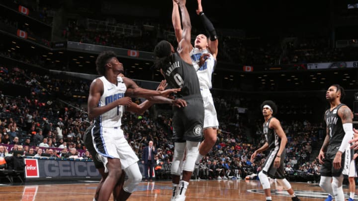 BROOKLYN, NY - JANUARY 23: Aaron Gordon #00 of the Orlando Magic goes to the basket against the Brooklyn Nets on January 23, 2019 at Barclays Center in Brooklyn, New York. NOTE TO USER: User expressly acknowledges and agrees that, by downloading and/or using this photograph, user is consenting to the terms and conditions of the Getty Images License Agreement. Mandatory Copyright Notice: Copyright 2019 NBAE (Photo by Ned Dishman/NBAE via Getty Images)