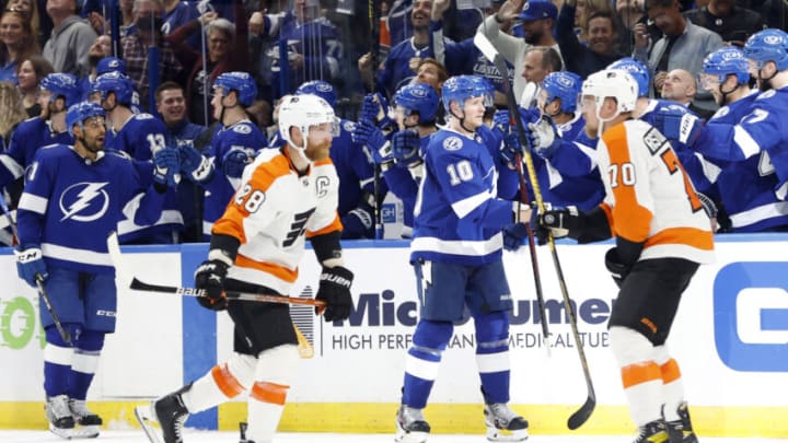 Nov 23, 2021; Tampa, Florida, USA; Tampa Bay Lightning right wing Corey Perry (10) is congratulated as he scores a goal against the Philadelphia Flyers during the second period at Amalie Arena. Mandatory Credit: Kim Klement-USA TODAY Sports