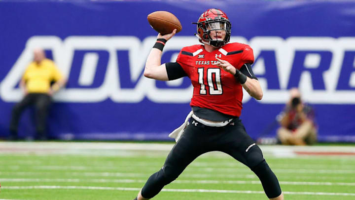HOUSTON, TX - SEPTEMBER 01: Alan Bowman #10 of the Texas Tech Red Raiders throws a pass in the third quarter against the Mississippi Rebels at NRG Stadium on September 1, 2018 in Houston, Texas. (Photo by Bob Levey/Getty Images)
