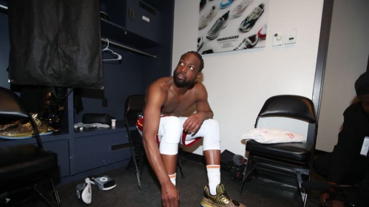 Dwyane Wade #3 of the Miami Heat looks on in the locker room(Photo by Issac Baldizon/NBAE via Getty Images)