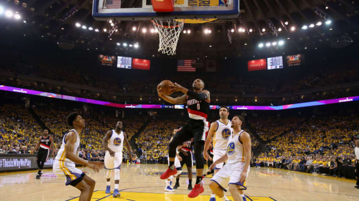 Fantasy NBA: OAKLAND, CA - APRIL 19: Damian Lillard #0 of the Portland Trail Blazers in action against the Golden State Warriors in Game Two of the Western Conference Quarterfinals during the 2017 NBA Playoffs at ORACLE Arena on April 19, 2017 in Oakland, California. NOTE TO USER: User expressly acknowledges and agrees that, by downloading and or using this photograph, User is consenting to the terms and conditions of the Getty Images License Agreement. (Photo by Ezra Shaw/Getty Images)