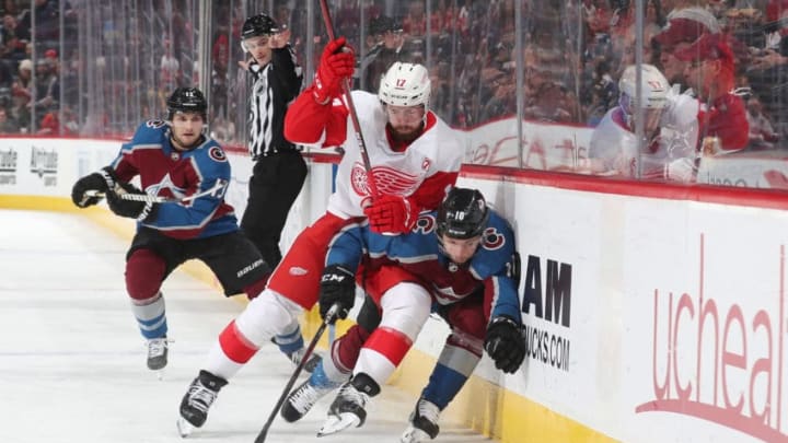 DENVER, CO - MARCH 5: Filip Hronek #17 of the Detroit Red Wings battles for position against Sven Andrighetto #10 of the Colorado Avalanche at the Pepsi Center on March 5, 2019 in Denver, Colorado. (Photo by Michael Martin/NHLI via Getty Images)