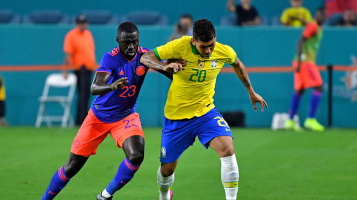 Sep 6, 2019; Miami Gardens, FL, USA; Brazil midfielder Roberto Fimino (20) Colombia midfielder Davinson Sanchez - Tottenham (23) Mandatory Credit: Steve Mitchell-USA TODAY Sports