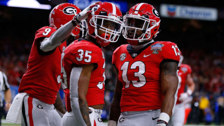 NEW ORLEANS, LOUISIANA - JANUARY 01: Brian Herrien #35 of the Georgia Bulldogs celebrates a touchdown during the first half of the Allstate Sugar Bowl against the Texas Longhorns at the Mercedes-Benz Superdome on January 01, 2019 in New Orleans, Louisiana. (Photo by Jonathan Bachman/Getty Images)