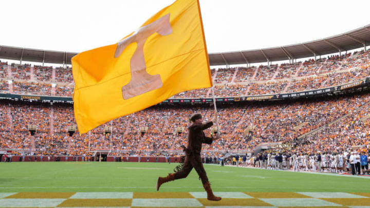 KNOXVILLE, TN - SEPTEMBER 08: Tennessee mascot Davy Crockett carries the flag across the end zone during a game between the Tennessee Volunteers and the East Tennessee State University Buccaneers at Neyland Stadium on September 8, 2018 in Knoxville, Tennessee. Tennesee won the game 59-3. (Photo by Donald Page/Getty Images)