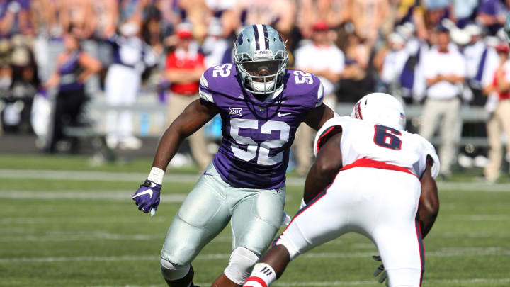 Florida Atlantic Owls running back Kerrith Whyte Jr. (6) tries to get past K-State football linebacker Charmeachealle Moore (52) – Mandatory Credit: Scott Sewell-USA TODAY Sports