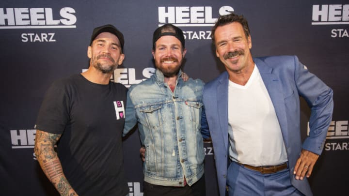 CHICAGO, IL - AUGUST 26: Phil Brooks “CM Punk”, Stephen Amell and David James Elliott pose for a photo during a screening episode of the Starz channel's wrestling drama "Heels" at the AMC River East Theater, on August 26, 2021 in Chicago, Illinois. (Photo by Barry Brecheisen/Getty Images)