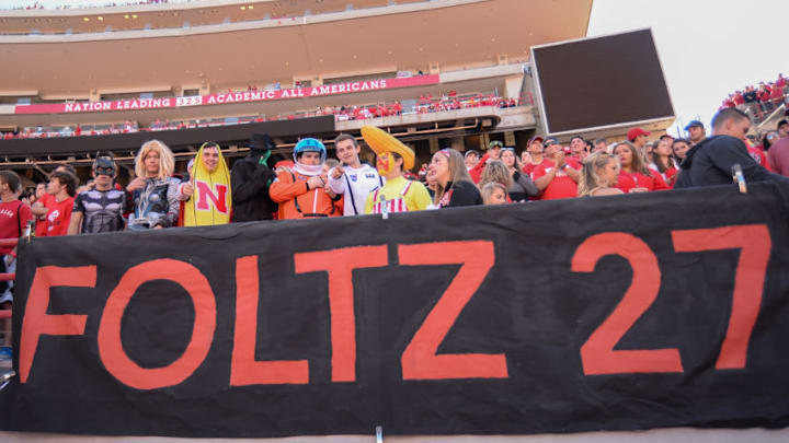 LINCOLN, NE - SEPTEMBER 10: Students of the Nebraska Cornhuskers honor deceased player Sam Foltz with a banner before the game against the Wyoming Cowboys at Memorial Stadium on September 10, 2016 in Lincoln, Nebraska. Nebraska defeated Wyoming 52-14. (Photo by Steven Branscombe/Getty Images)