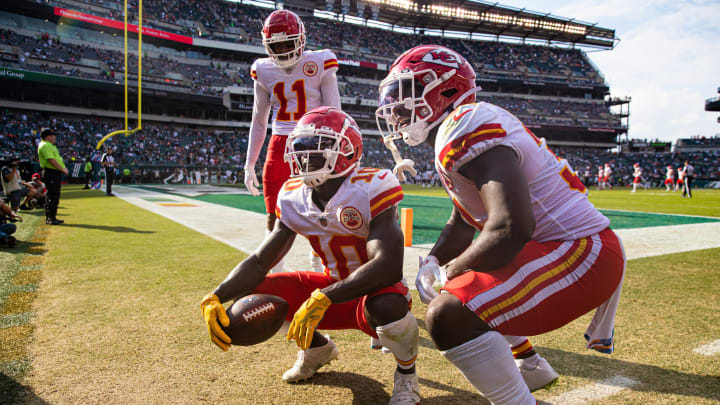 Oct 3, 2021; Philadelphia, Pennsylvania, USA; Kansas City Chiefs wide receiver Tyreek Hill (10) reacts with wide receiver Demarcus Robinson (11) and running back Darrel Williams (31) after his touchdown catch against the Philadelphia Eagles during the fourth quarter at Lincoln Financial Field. Mandatory Credit: Bill Streicher-USA TODAY Sports