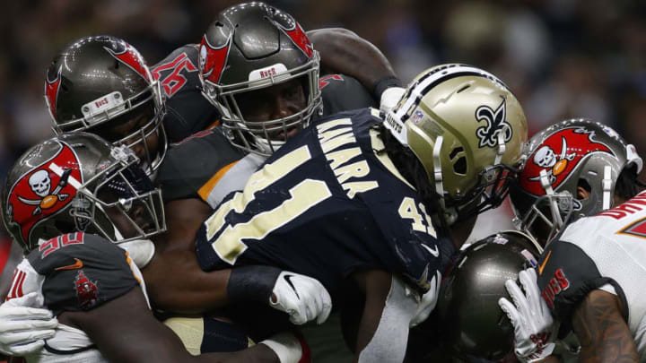 NEW ORLEANS, LA - SEPTEMBER 09: Alvin Kamara #41 of the New Orleans Saints is tackled by the Tampa Bay Buccaneers defense during the second half at the Mercedes-Benz Superdome on September 9, 2018 in New Orleans, Louisiana. (Photo by Jonathan Bachman/Getty Images)