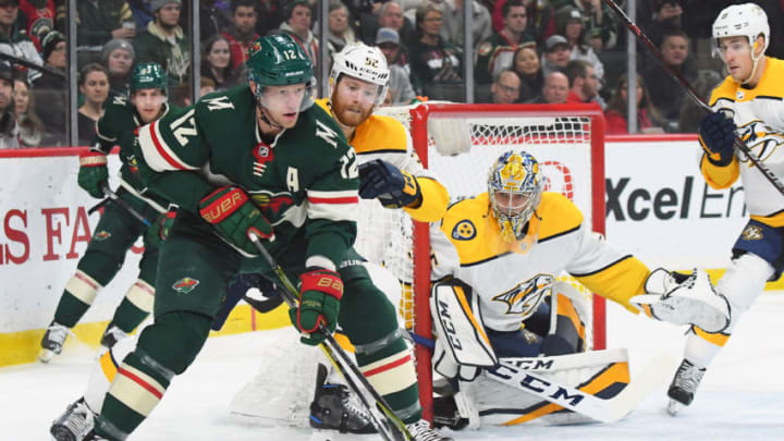 ST. PAUL, MN - DECEMBER 29: Minnesota Wild Center Eric Staal (12) looks to pas in front of Nashville Predators Goalie Pekka Rinne (35) as Nashville Predators Defenceman Matt Irwin (52) defends during a NHL game between the Minnesota Wild and Nashville Predators on December 29, 2017 at Xcel Energy Center in St. Paul, MN. The Wild defeated the Predators 4-2.(Photo by Nick Wosika/Icon Sportswire via Getty Images)