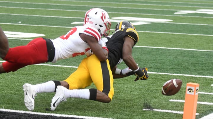 IOWA CITY, IA - NOVEMBER 23: Iowa Hawkeyes wide receiver Ihmir Smith-Marsette (6) can't hang on to a ball near the goal line as Nebraska Cornhuskers cornerback DiCaprio Bootle (23) defends during a Big Ten Conference football game between the Nebraska Cornhuskers and the Iowa Hawkeyes on November 23, 2018, at Kinnick Stadium, Iowa City, IA. (Photo by Keith Gillett/Icon Sportswire via Getty Images)