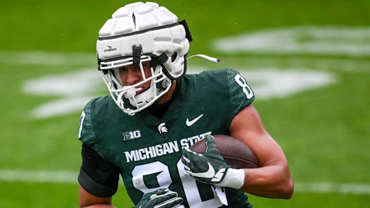 Michigan State’s Ian Stewart runs after a catch during the spring football game on Saturday, April 24, 2021, at Spartan Stadium in East Lansing.210424 Msu Spring Game 080a