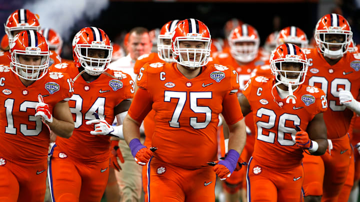 ARLINGTON, TEXAS – DECEMBER 29: Mitch Hyatt #75 of the Clemson Tigers takes the field with teammates before the game against the Notre Dame Fighting Irish during the College Football Playoff Semifinal Goodyear Cotton Bowl Classic at AT&T Stadium on December 29, 2018 in Arlington, Texas. (Photo by Ron Jenkins/Getty Images)