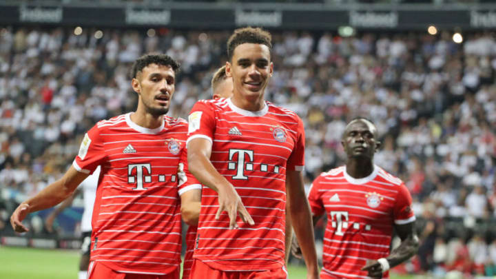 Bayern Munich players celebrating Jamal Musiala's second goal against Eintracht Frankfurt