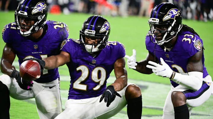 Aug 14, 2021; Baltimore, Maryland, USA; Baltimore Ravens cornerback Shaun Wade (29) celebrates with cornerback Brandon Stephens (21) and Baltimore Ravens cornerback Davontae Harris (33) after interception a New Orleans Saints quarterback Ian Book (not pictured ) pass during the second half at M&T Bank Stadium. Mandatory Credit: Tommy Gilligan-USA TODAY Sports
