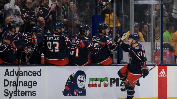 Oct 20, 2022; Columbus, Ohio, USA; Columbus Blue Jackets right wing Justin Danforth (17) celebrates with teammates on the bench after scoring a goal against the Nashville Predators in the third period at Nationwide Arena. Mandatory Credit: Aaron Doster-USA TODAY Sports