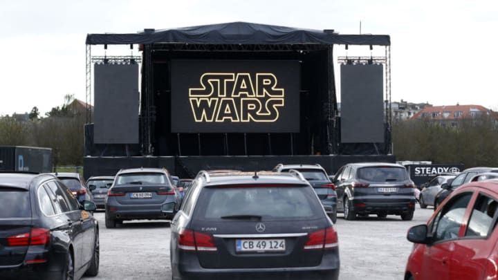 AARHUS, DENMARK - APRIL 25: Visitors watch Star Wars episode IX "The Rise of Skywalker" film in a drive-in cinema, organised by P Scenen on April 25, 2020 in Aarhus, Denmark. Denmark relaxes restrictions imposed to fight coronavirus. The country reported 8445 cases and 418 deaths from Covid-19. The Coronavirus (COVID-19) pandemic has spread to many countries across the world, claiming over 191,000 lives and infecting over 2.7 million people. (Photo by Julien Hekimian/Getty Images)