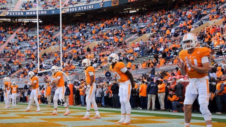 Nov 19, 2016; Knoxville, TN, USA; The Tennessee Volunteers quarterbacks warmup before the game against the Missouri Tigers at Neyland Stadium. Mandatory Credit: Randy Sartin-USA TODAY Sports