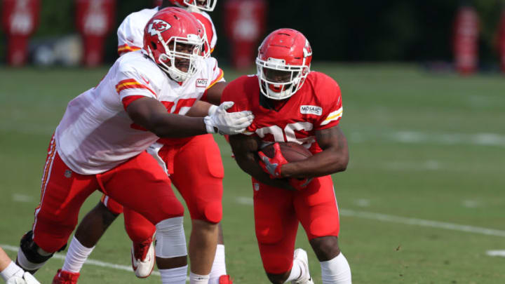 ST. JOSEPH, MO - AUGUST 05: Kansas City Chiefs running back Damien Williams (26) evades a tackle during a run during training camp on August 5, 2018 at Missouri Western State University in St. Joseph, MO. (Photo by Scott Winters/Icon Sportswire via Getty Images)