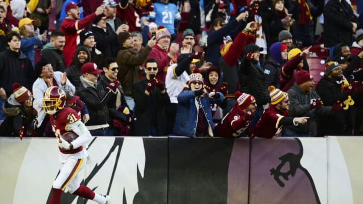 LANDOVER, MD - NOVEMBER 24: Fabian Moreau #31 of the Washington Redskins celebrates with fans after intercepting a pass by Jeff Driskel #2 of the Detroit Lions (not pictured) in the fourth quarter at FedExField on November 24, 2019 in Landover, Maryland. (Photo by Patrick McDermott/Getty Images)