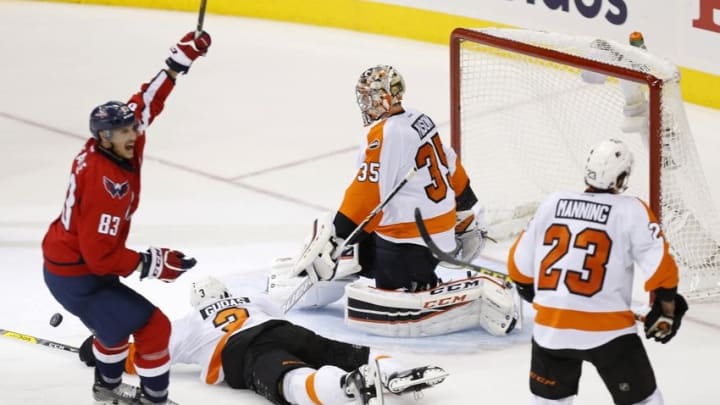 Apr 14, 2016; Washington, DC, USA; Washington Capitals center Jay Beagle (83) celebrates after scoring a goal on Philadelphia Flyers goalie Steve Mason (35) in the third period in game one of the first round of the 2016 Stanley Cup Playoffs at Verizon Center. The Capitals won 2-0, and lead the series 1-0. Mandatory Credit: Geoff Burke-USA TODAY Sports