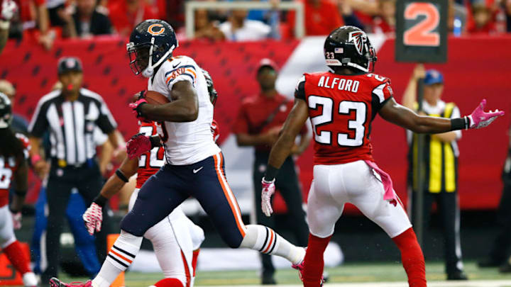 ATLANTA, GA - OCTOBER 12: Josh Morgan #19 of the Chicago Bears takes this reception in for a touchdown against Robert Alford #23 of the Atlanta Falcons at Georgia Dome on October 12, 2014 in Atlanta, Georgia. (Photo by Kevin C. Cox/Getty Images)