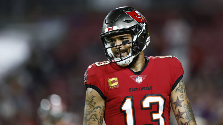 TAMPA, FLORIDA – OCTOBER 27: Mike Evans, #13 of the Tampa Bay Buccaneers, warms up before the game against the Baltimore Ravens at Raymond James Stadium on October 27, 2022, in Tampa, Florida. (Photo by Douglas P. DeFelice/Getty Images)