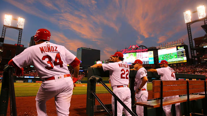 FanDuel MLB: ST. LOUIS, MO - JUNE 12: Yairo Munoz #34 and Mike Matheny #22 of the St. Louis Cardinals watch an at-bat against the San Diego Padres in the fifth inning at Busch Stadium on June 12, 2018 in St. Louis, Missouri. (Photo by Dilip Vishwanat/Getty Images)