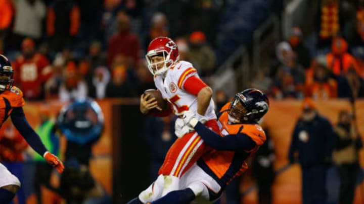 DENVER, CO – DECEMBER 31: Quarterback Patrick Mahomes #15 of the Kansas City Chiefs is sacked by defensive end DeMarcus Walker #57 of the Denver Broncos during the fourth quarter at Sports Authority Field at Mile High on December 31, 2017 in Denver, Colorado. The Chiefs defeated the Broncos 27-24. (Photo by Justin Edmonds/Getty Images)