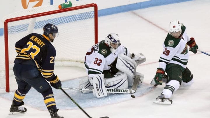 Sep 26, 2016; State College, PA, USA; Minnesota Wild goalie Alex Stalock (32) blocks a shot on goal during the third period against the Buffalo Sabres during a preseason hockey game at Pegula Ice Arena. The Wild defeated the Sabres 2-1. Mandatory Credit: Matthew O