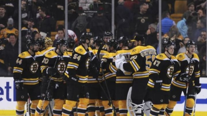 Mar 1, 2016; Boston, MA, USA; The Boston Bruins celebrate after defeating the Calgary Flames at TD Garden. Mandatory Credit: Bob DeChiara-USA TODAY Sports