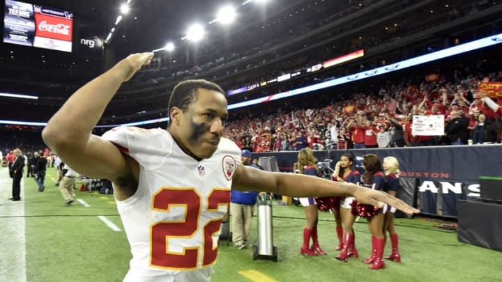 Jan 9, 2016; Houston, TX, USA; Kansas City Chiefs cornerback Marcus Peters (22) celebrates as he leaves the field following the Chiefs 30-0 victory against the Houston Texans in the AFC Wild Card playoff football game at NRG Stadium . Mandatory Credit: John David Mercer-USA TODAY Sports
