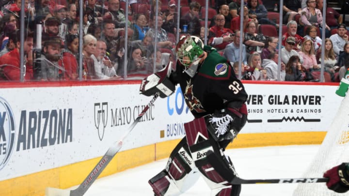 GLENDALE, ARIZONA - OCTOBER 19: Antti Raanta #32 of the Arizona Coyotes stops the puck behind the net against the Ottawa Senators at Gila River Arena on October 19, 2019 in Glendale, Arizona. (Photo by Norm Hall/NHLI via Getty Images)
