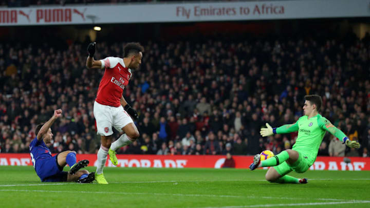 LONDON, ENGLAND - JANUARY 19: Kepa Arrizabalaga of Chelsea saves a shot from Pierre-Emerick Aubameyang of Arsenal during the Premier League match between Arsenal FC and Chelsea FC at Emirates Stadium on January 19, 2019 in London, United Kingdom. (Photo by Catherine Ivill/Getty Images)