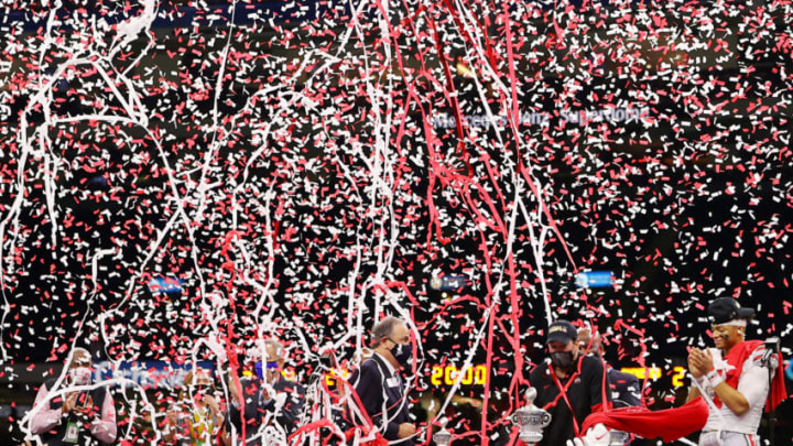 NEW ORLEANS, LOUISIANA - JANUARY 01: Confetti falls on head coach Ryan Day and Justin Fields #1 of the Ohio State Buckeyes after they defeated the Clemson Tigers 49-28 during the College Football Playoff semifinal game at the Allstate Sugar Bowl at Mercedes-Benz Superdome on January 01, 2021 in New Orleans, Louisiana. (Photo by Kevin C. Cox/Getty Images)