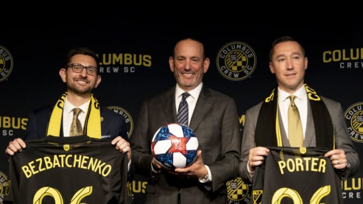 COLUMBUS, OH - JANUARY 09: Crew SC President Tim Bezbatchenko , Major League Soccer Commissioner Don Garber and Crew SC Head Coach Caleb Porter during the Introductory Press Conference held at the The Ivory Room in Columbus, Ohio on January 9, 2019. (Photo by Jason Mowry/Icon Sportswire via Getty Images)