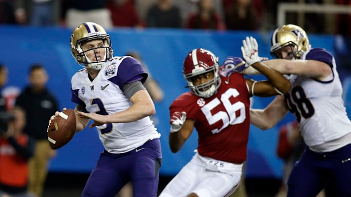 Dec 31, 2016; Atlanta, GA, USA; Washington Huskies quarterback Jake Browning (3) looks to pass as Alabama Crimson Tide linebacker Tim Williams (56) pressures during the second quarter in the 2016 CFP semifinal at the Peach Bowl at the Georgia Dome. Mandatory Credit: Brett Davis-USA TODAY Sports