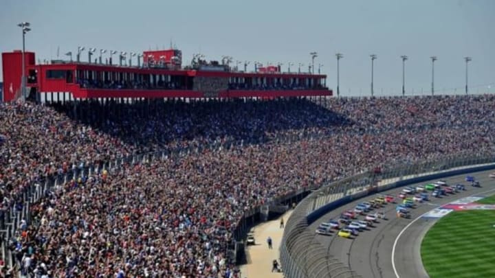 March 23, 2013; Fontana, CA, USA; General view as NASCAR Sprint Cup Series driver Denny Hamlin (11) and driver Matt Kenseth (20) lead the start during the Auto Club 400 at Auto Club Speedway. Mandatory Credit: Gary A. Vasquez-USA TODAY Sports