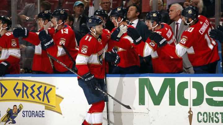 SUNRISE, FL – OCT. 18: Jonathan Huberdeau #11 of the Florida Panthers celebrates his goal with teammates during the first period against the Colorado Avalanche at the BB&T Center on October 18, 2019 in Sunrise, Florida. (Photo by Eliot J. Schechter/NHLI via Getty Images)