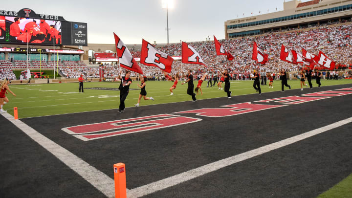 The Texas Tech Red Raider cheerleaders celebrate a touchdown. (Photo by John Weast/Getty Images)