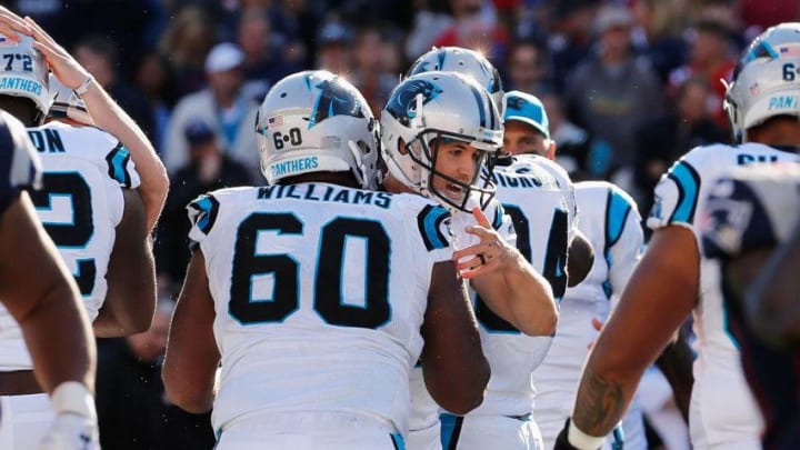 FOXBORO, MA - OCTOBER 01: Graham Gano #9 of the Carolina Panthers celebrates with Daryl Williams #60 after kicking a 48-yard field goal during the fourth quarter to defeat the New England Patriots 33-30 at Gillette Stadium on October 1, 2017 in Foxboro, Massachusetts. (Photo by Jim Rogash/Getty Images)