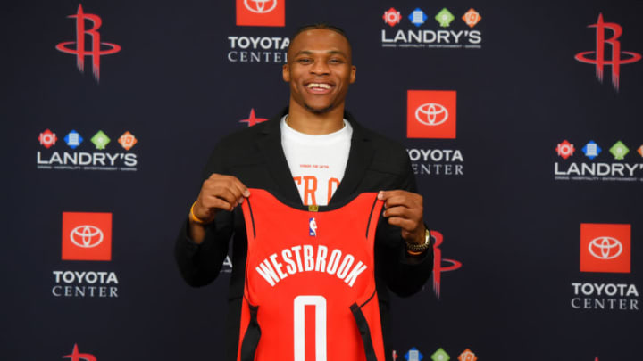 HOUSTON, TX - JULY 26: Russell Westbrook #0 of the Houston Rockets pose for a photo during the Houston Rockets Introductory Press Conference on July 26, 2019 at the Toyota Center in Houston, Texas. NOTE TO USER: User expressly acknowledges and agrees that, by downloading and or using this photograph, User is consenting to the terms and conditions of the Getty Images License Agreement. Mandatory Copyright Notice: Copyright 2019 NBAE (Photo by Bill Baptist/NBAE via Getty Images)