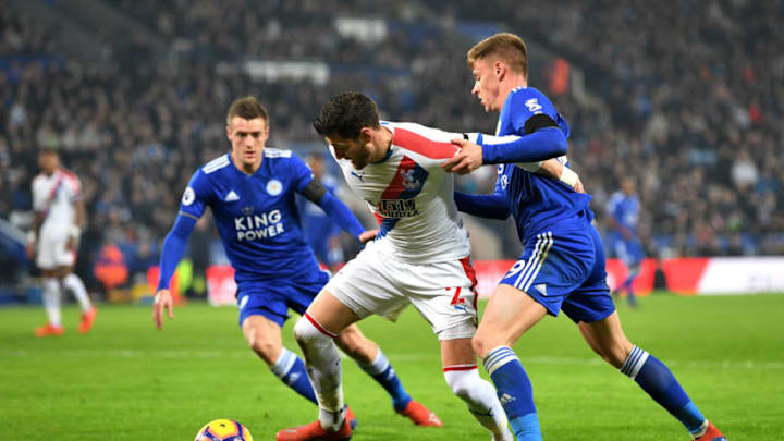 LEICESTER, ENGLAND - FEBRUARY 23: Harvey Barnes and Jamie Vardy of Leicester City challenge Joel Ward of Crystal Palace during the Premier League match between Leicester City and Crystal Palace at The King Power Stadium on February 23, 2019 in Leicester, United Kingdom. (Photo by Michael Regan/Getty Images)