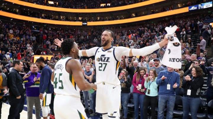 SALT LAKE CITY, UT - JANUARY 25: Donovan Mitchell #45 of the Utah Jazz and Rudy Gobert #27 of the Utah Jazz celebrate after a win against the Dallas Mavericks on January 25, 2020 at vivint.SmartHome Arena in Salt Lake City, Utah. NOTE TO USER: User expressly acknowledges and agrees that, by downloading and or using this Photograph, User is consenting to the terms and conditions of the Getty Images License Agreement. Mandatory Copyright Notice: Copyright 2020 NBAE (Photo by Melissa Majchrzak/NBAE via Getty Images)