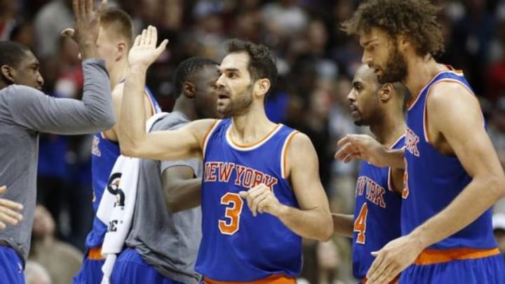 Jan 5, 2016; Atlanta, GA, USA; New York Knicks guard Jose Calderon (3) celebrates a play with teammates in the fourth quarter of their game against the Atlanta Hawks at Philips Arena. The Knicks won 107-101. Mandatory Credit: Jason Getz-USA TODAY Sports